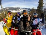 friends on a ski lift
