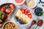 bowl of healthy oats and various fruit