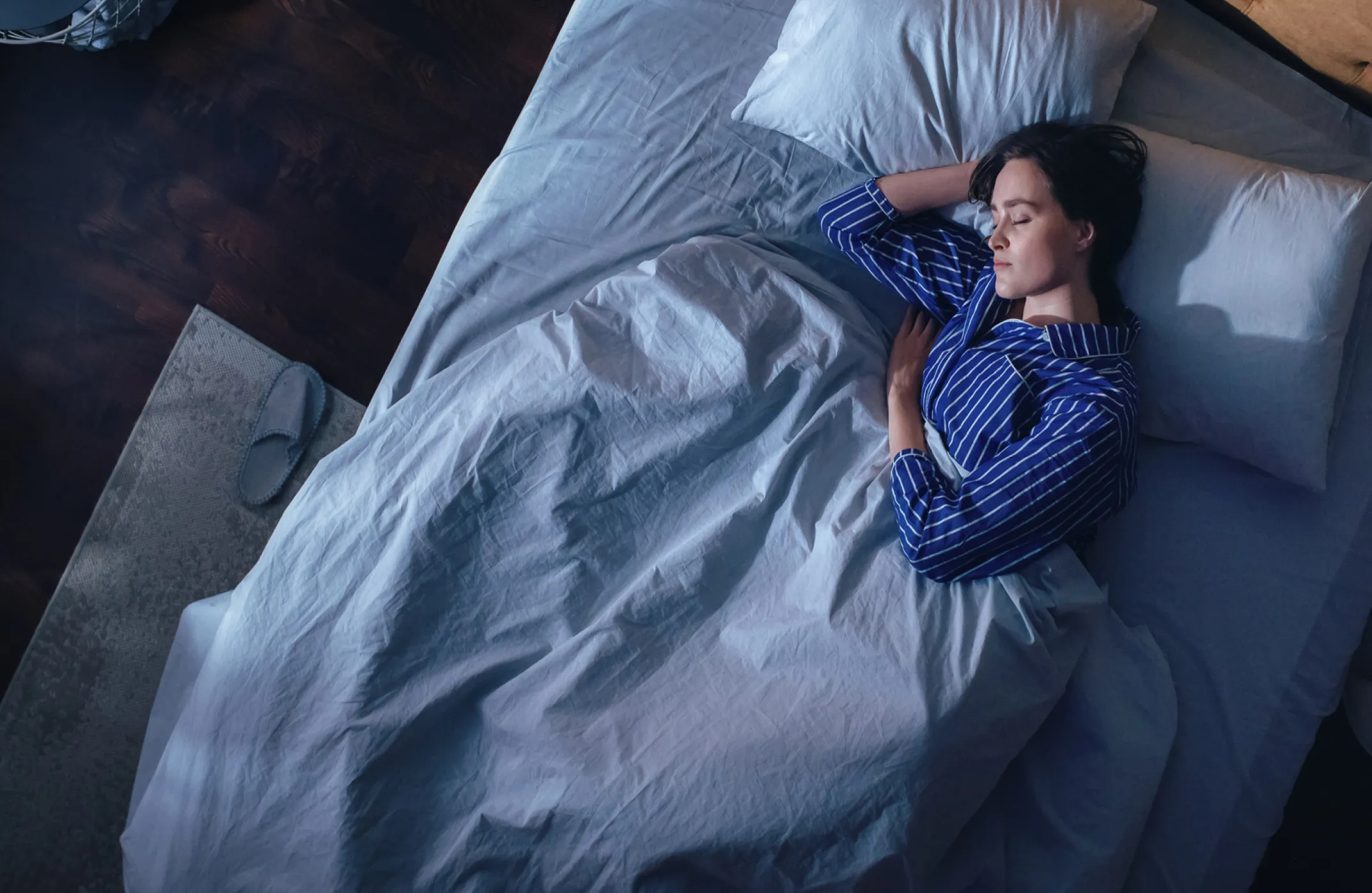 Woman sleeping in bed