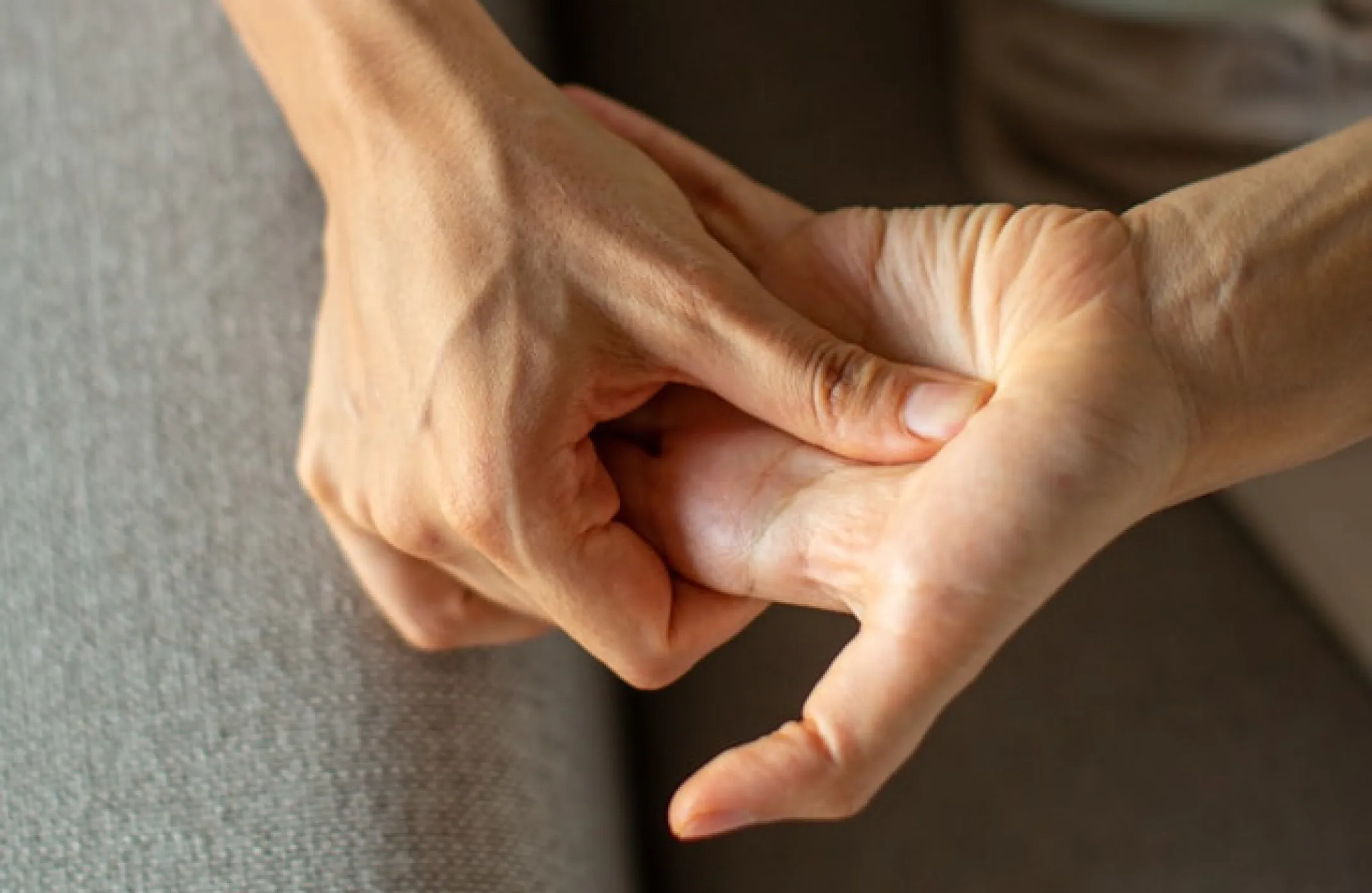 hand pushing on pressure point